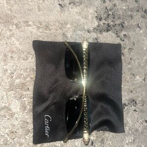 Cartier Sunglasses with Black and Gold Design